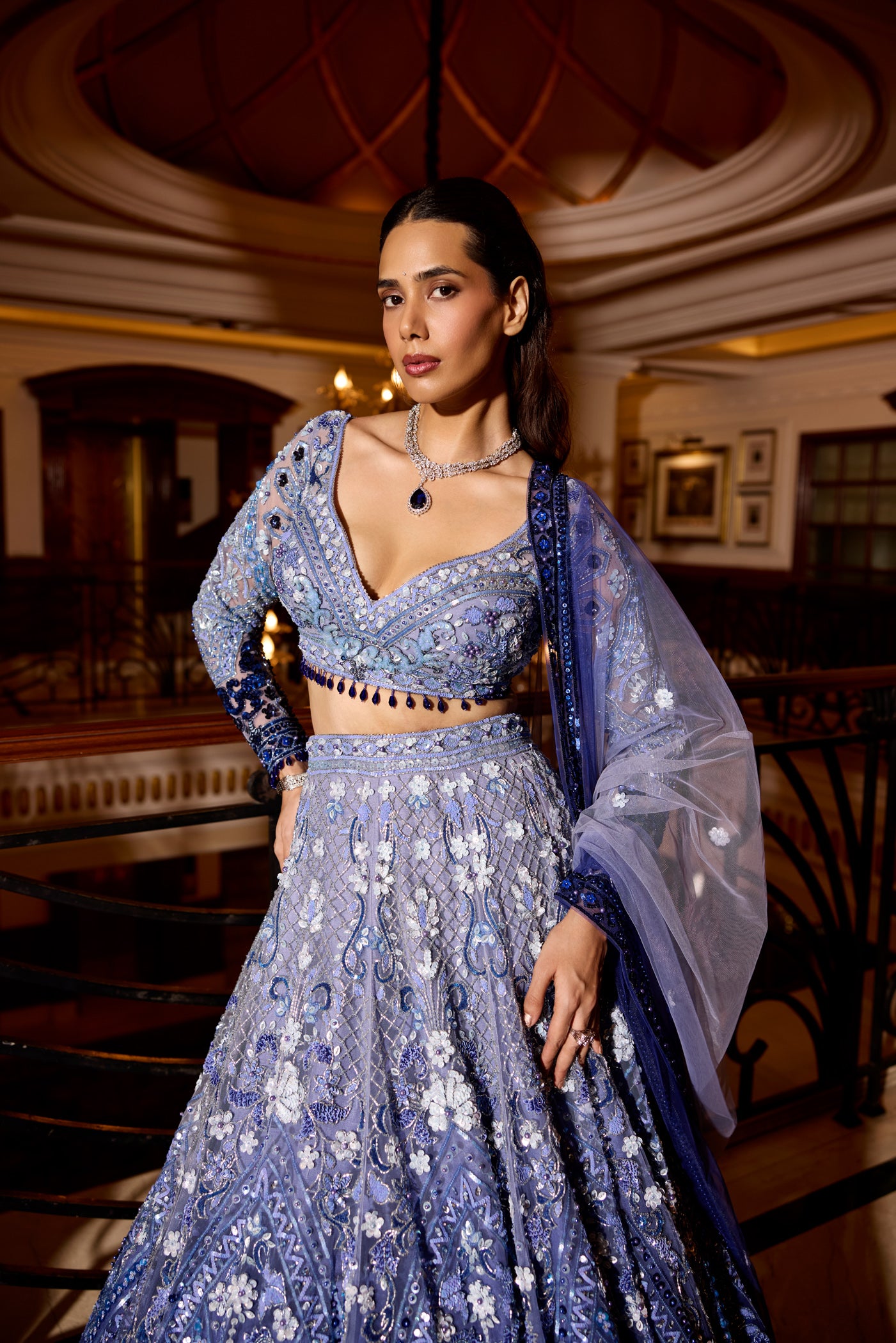 Blue ombre lehenga with full sleeve blouse and intricate embellishments for cocktails and sangeet