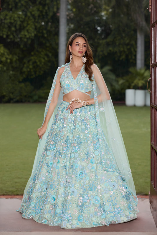 Aqua blue floral embroidered lehenga set with blouse and dupatta by Opus Atelier, handcrafted for modern brides, festive wear, and sangeet weddings