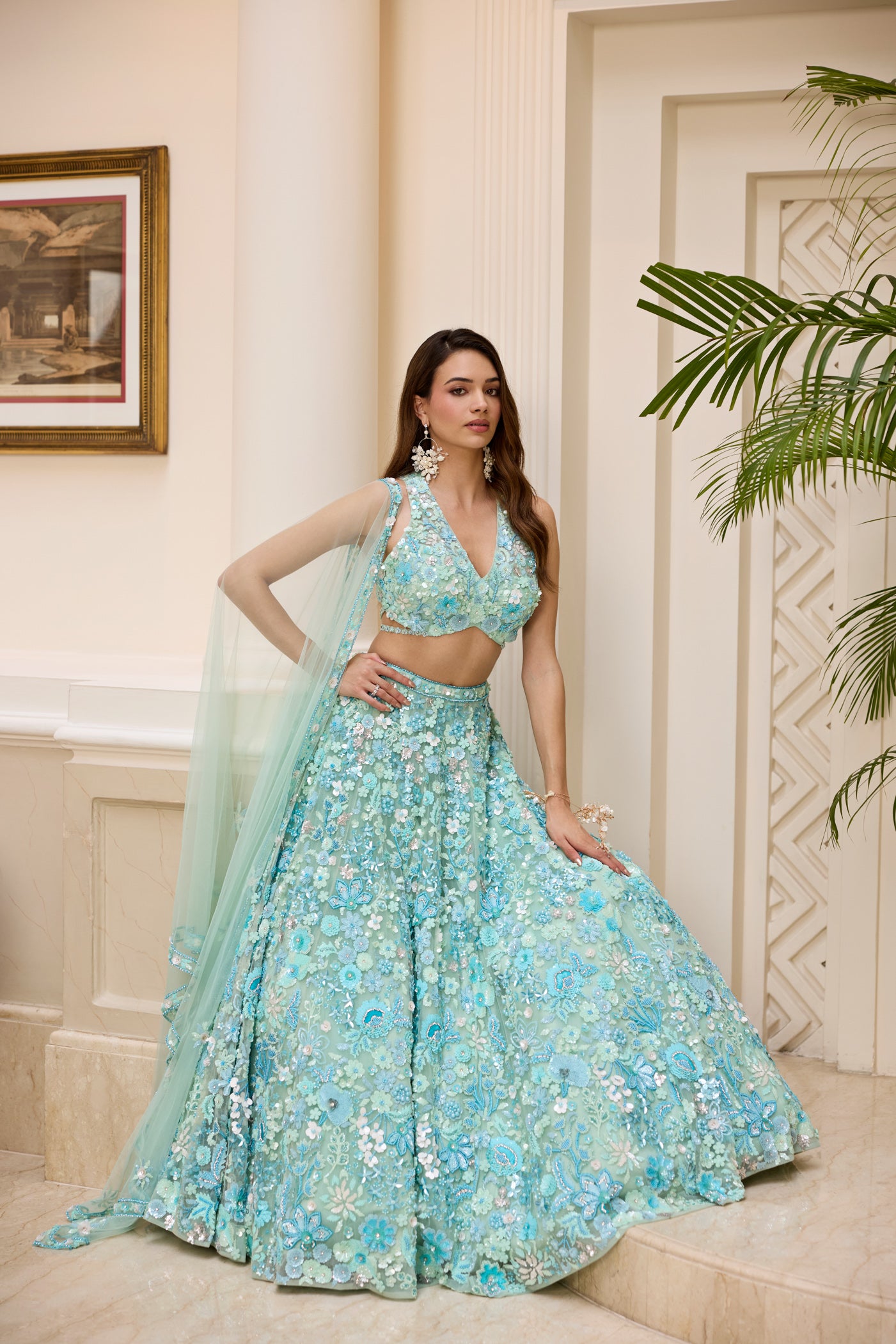 Aqua blue floral embroidered lehenga set with blouse and dupatta by Opus Atelier, handcrafted for modern brides, festive wear, and sangeet weddings