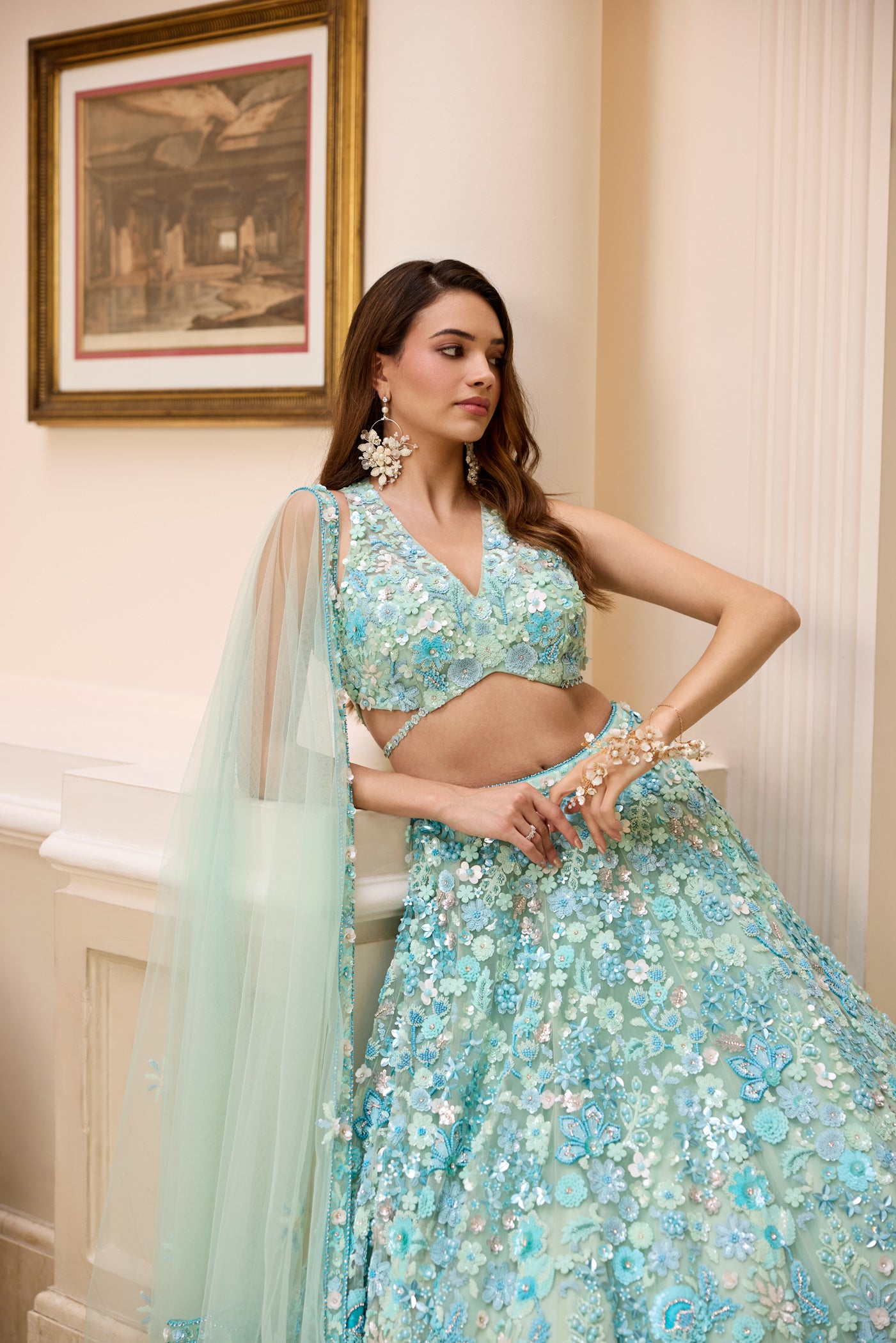 Aqua blue floral embroidered lehenga set with blouse and dupatta by Opus Atelier, handcrafted for modern brides, festive wear, and sangeet weddings