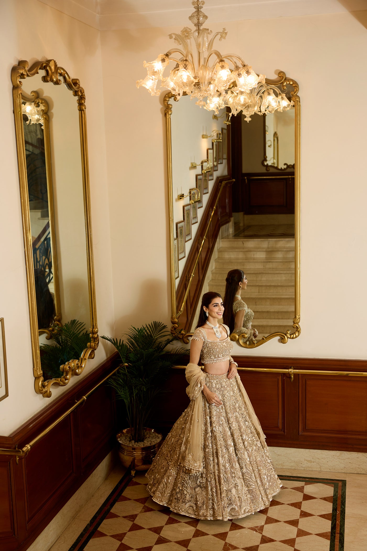 Golden wedding lehenga set with heavy embroidery and couture craftsmanship in a victorian era hotel by opus atelier