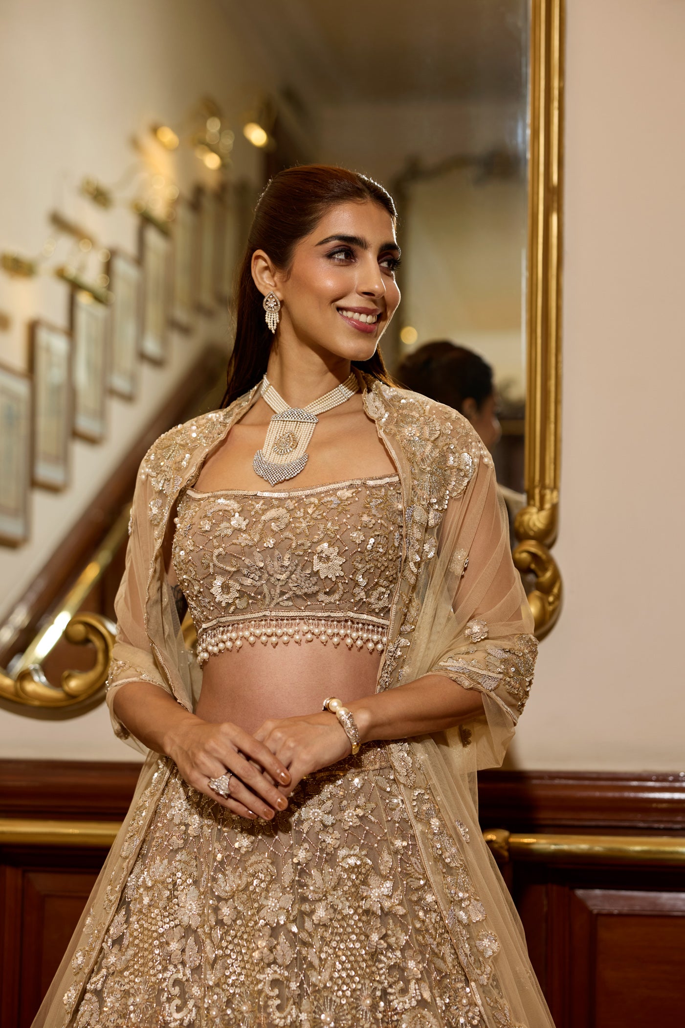 Luxury Indian bridal lehenga in champagne gold with modern blouse and designer dupatta