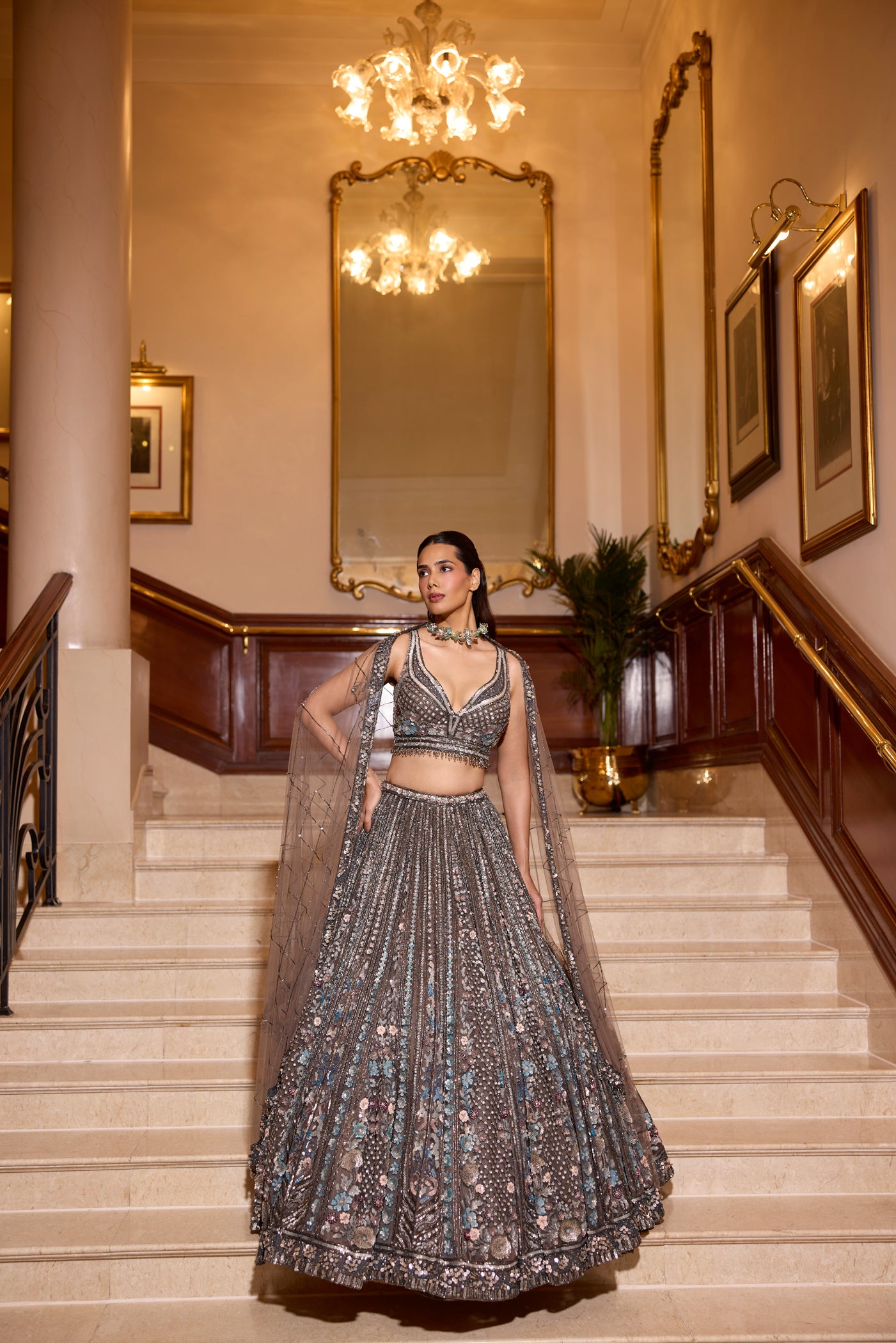 Modern Indian wedding lehenga in grey silver palette with floral threadwork and sequin detailing