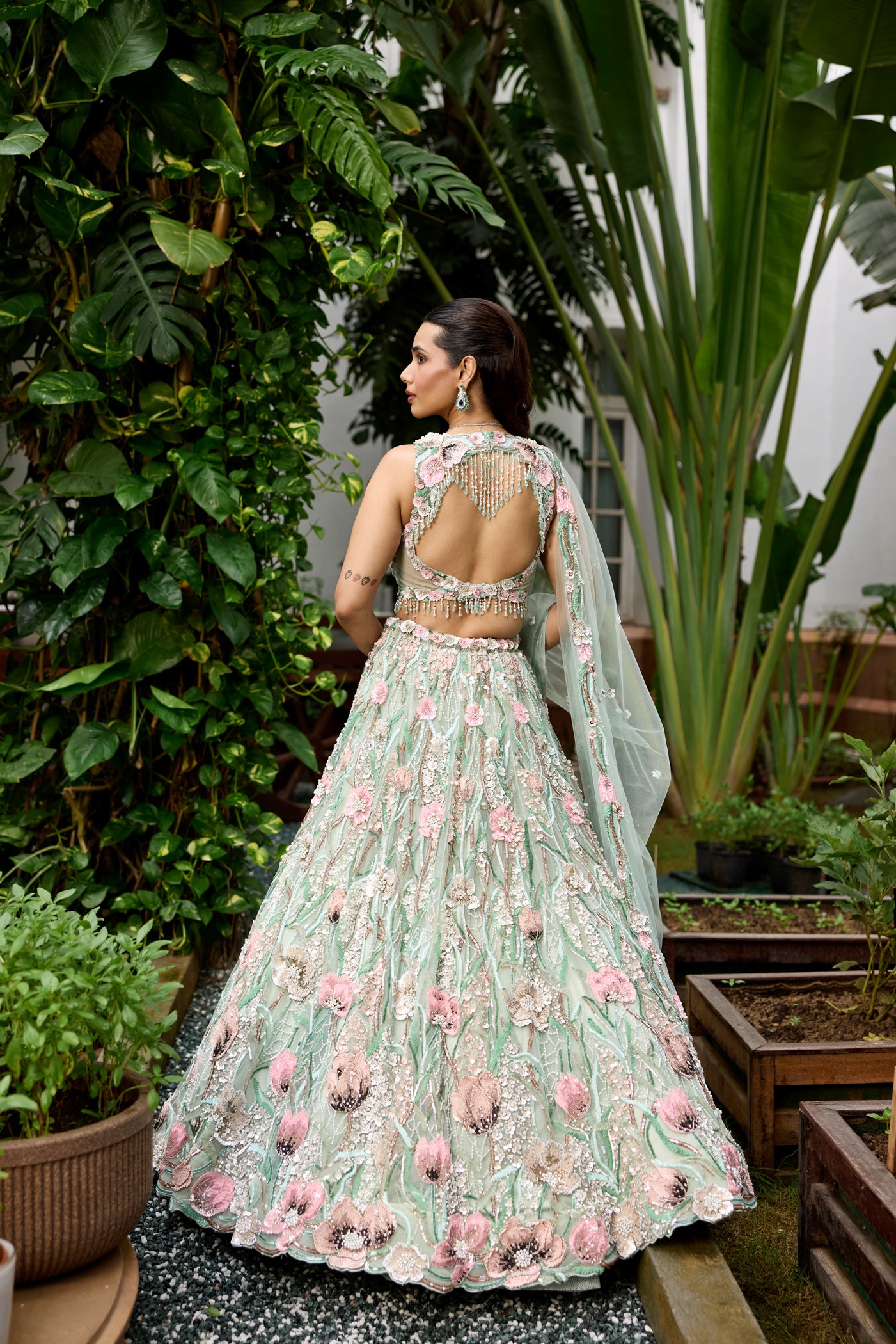 Modern couture lehenga with pastel tones, 3D flowers and elegant dupatta