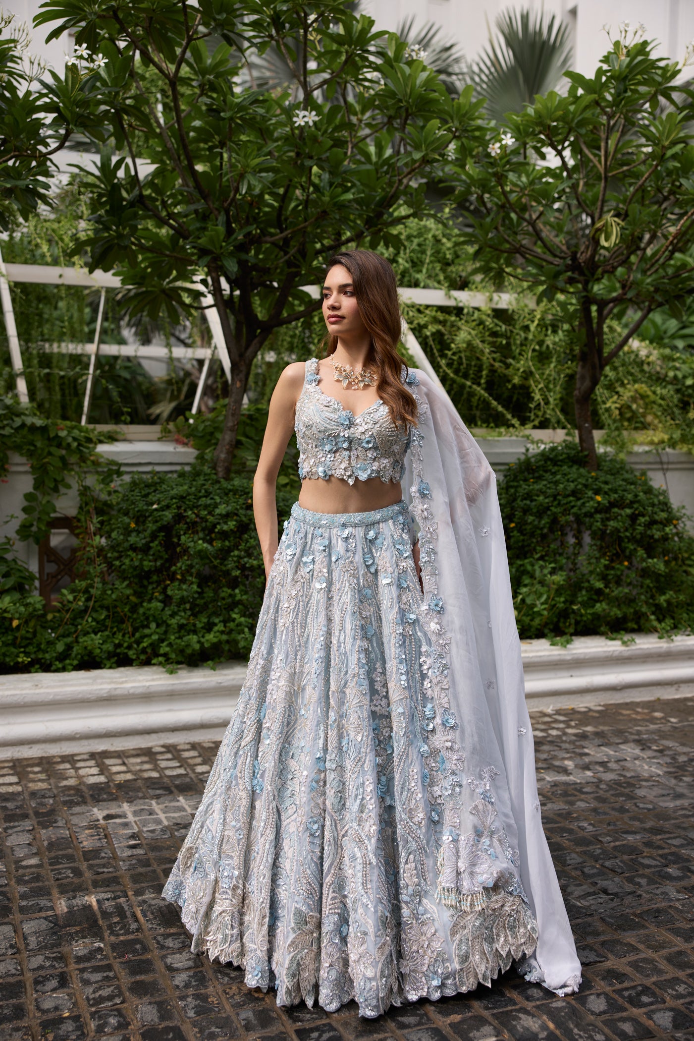 Luxury powder blue bridal lehenga set with hand-embroidered details and dupatta