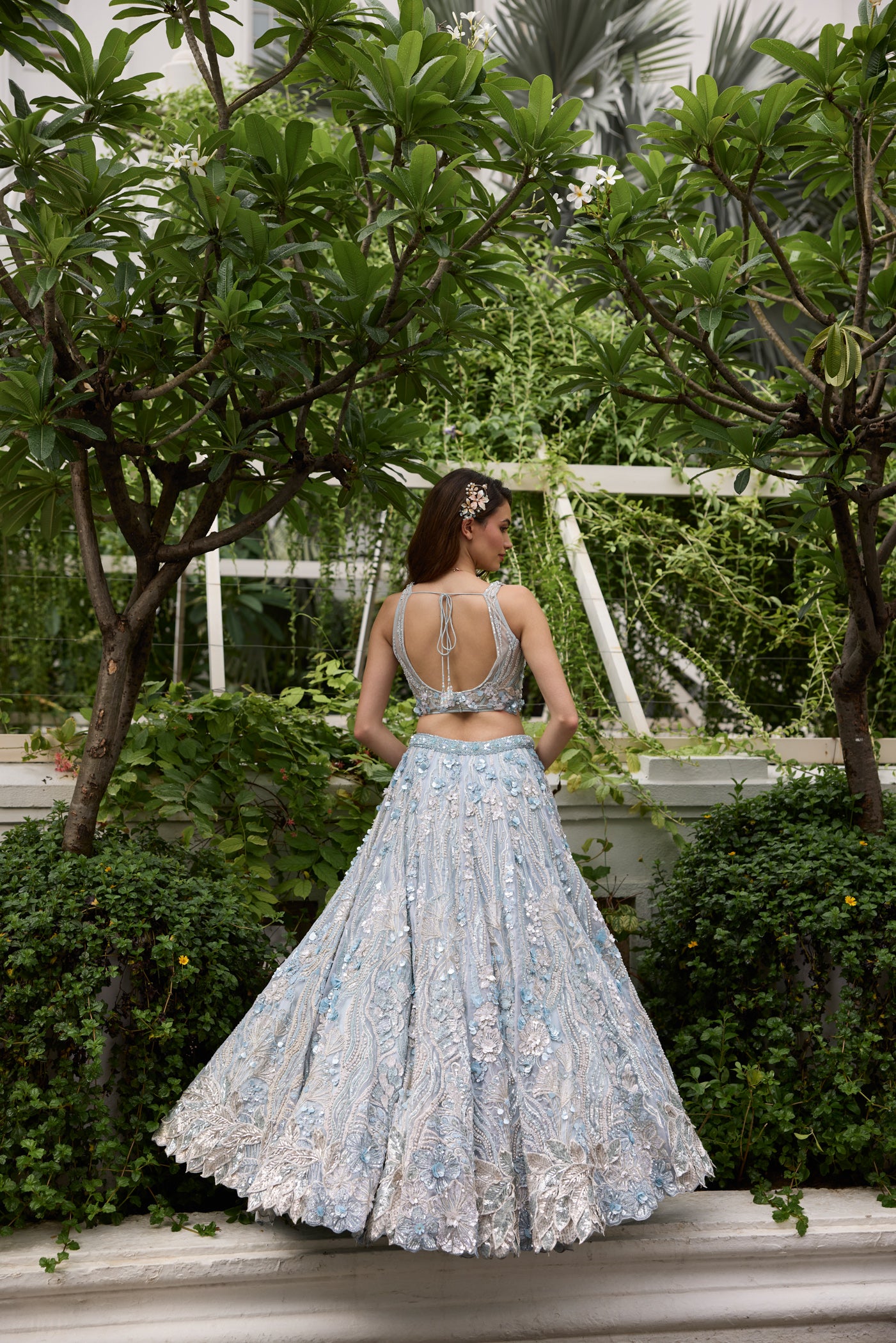 Powder blue lehenga with silver embroidery and floral 3D embellishments by Opus Atelier