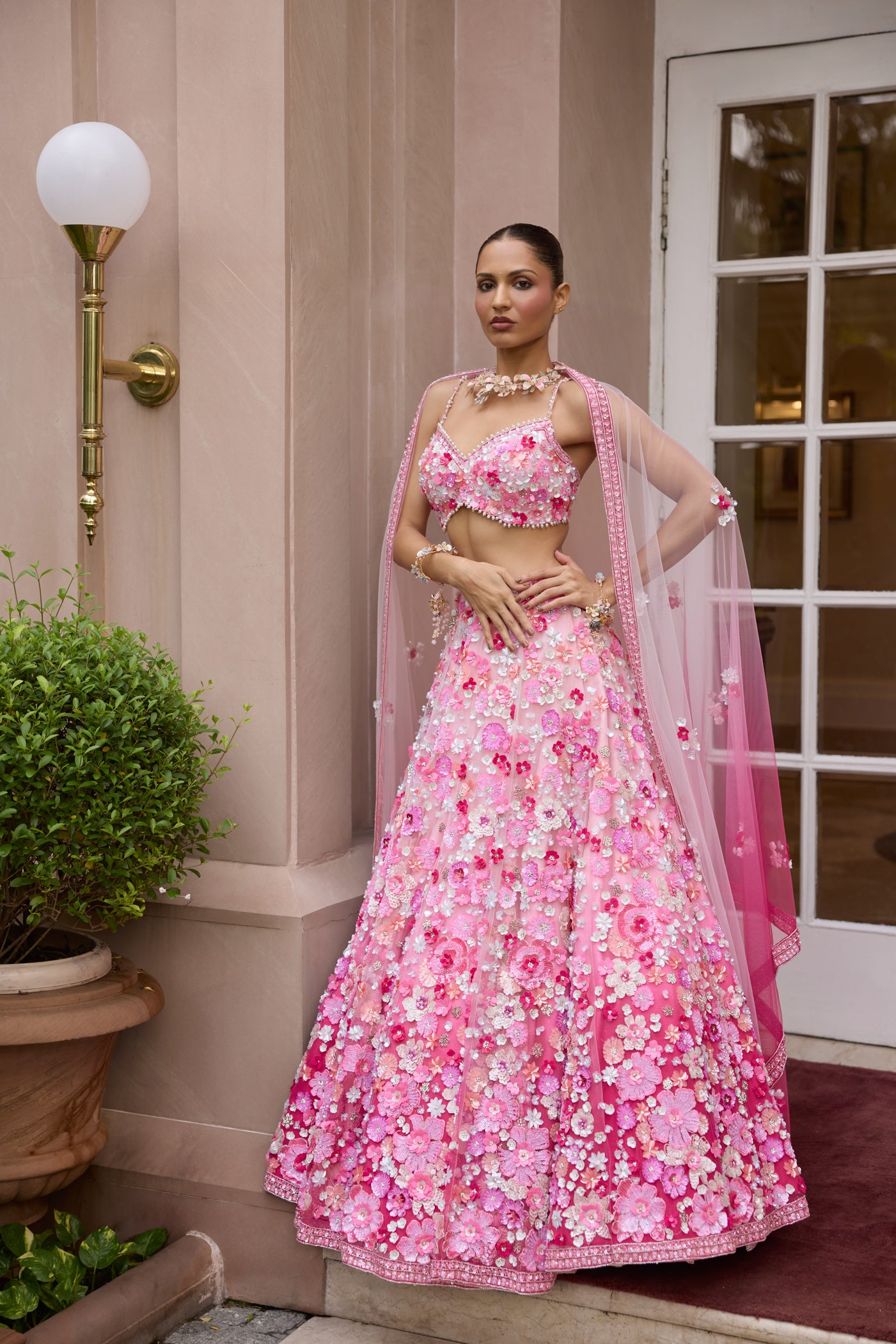 Rosé pink ombre floral embroidered lehenga set with intricate 3D embellishments and blouse by Opus Atelier, ideal for modern brides and sangeet weddings and carnival function lehenga