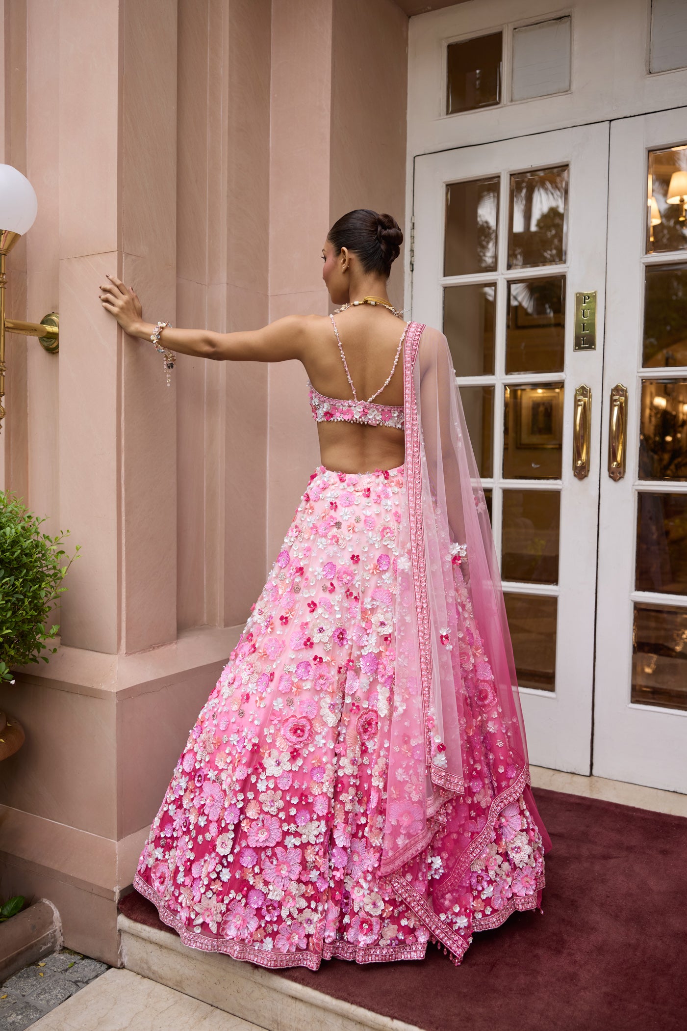 Rosé pink ombre floral embroidered lehenga set with intricate 3D embellishments and blouse by Opus Atelier, ideal for modern brides and sangeet weddings and carnival function lehenga
