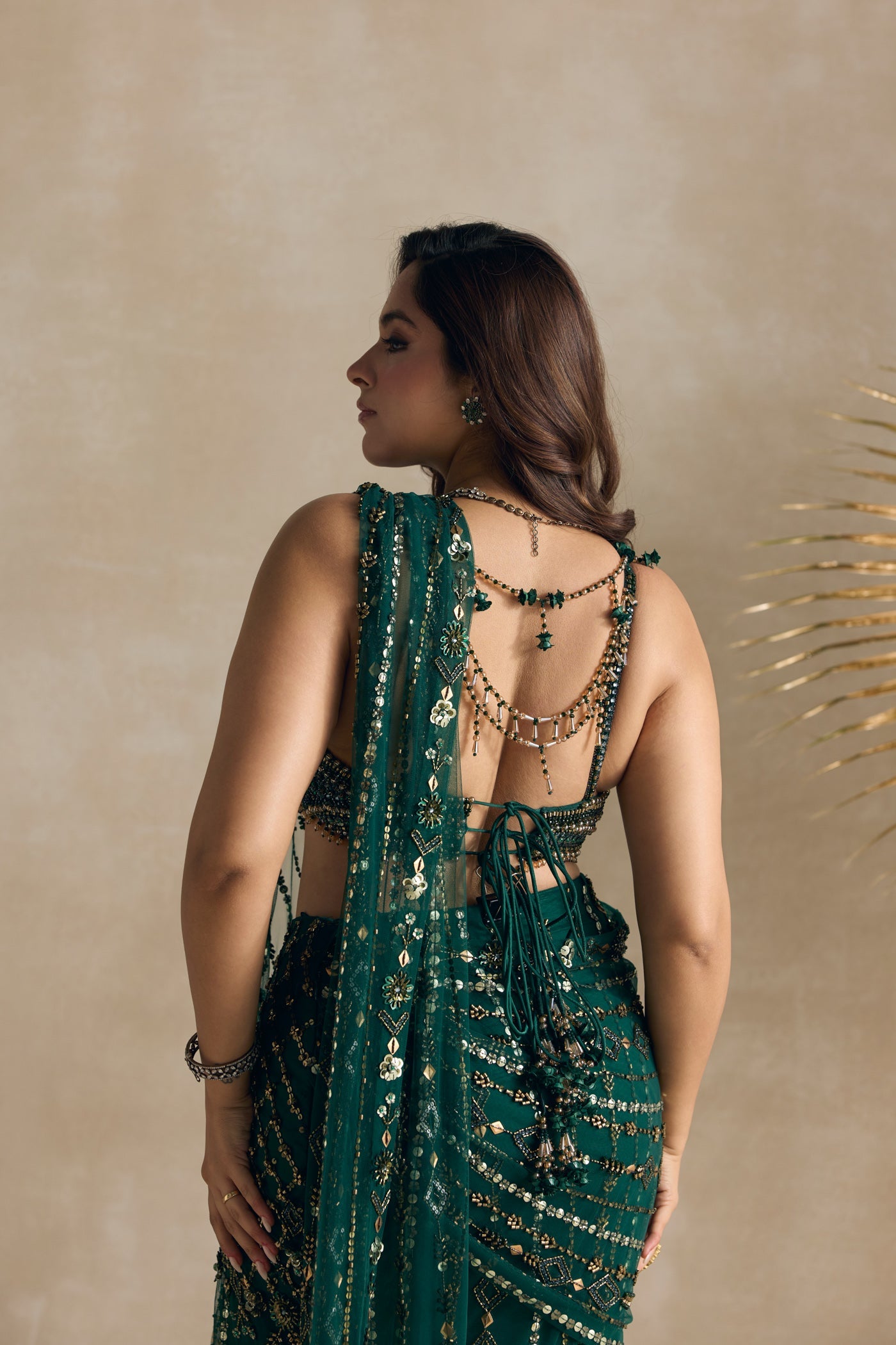 EMERALD GREEN AND GOLD PRE DRAPED SAREE