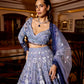 Blue ombre lehenga with full sleeve blouse and intricate embellishments for cocktails and sangeet