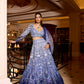 Designer blue ombre lehenga with mirror work, sequins, and floral detailing for luxury bridal wear