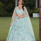Aqua blue floral embroidered lehenga set with blouse and dupatta by Opus Atelier, handcrafted for modern brides, festive wear, and sangeet weddings