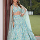 Aqua blue floral embroidered lehenga set with blouse and dupatta by Opus Atelier, handcrafted for modern brides, festive wear, and sangeet weddings