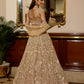 Golden wedding lehenga set with heavy embroidery and couture craftsmanship