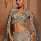 Grey silver to midnight blue ombré lehenga set with intricate zari and sequin embroidery, paired with blouse and dupatta by Opus Atelier, ideal for bridal receptions and evening cocktails