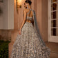 Grey silver to midnight blue ombré lehenga set with intricate zari and sequin embroidery, paired with trending blouse back design and dupatta by Opus Atelier, ideal for bridal receptions and evening cocktails