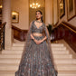 Model wearing a grey silver sequin lehenga with floral embroidery and sheer dupatta – Opus Atelier bridal couture.