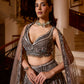 Elegant sequin lehenga in grey tones with pastel floral accents, designed for weddings and cocktail nights