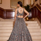 Designer bridal lehenga in silver grey with delicate 3D floral embroidery and flowing silhouette blouse back design trending