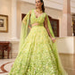 Designer lime green ombré embroidered lehenga set by Opus Atelier, featuring handcrafted floral motifs and sequins, ideal for bridal wear, destination weddings, and festive celebrations