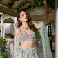 Seafoam green multicolour floral embroidered lehenga set with blouse and dupatta by Opus Atelier, perfect for modern brides and cocktail weddings