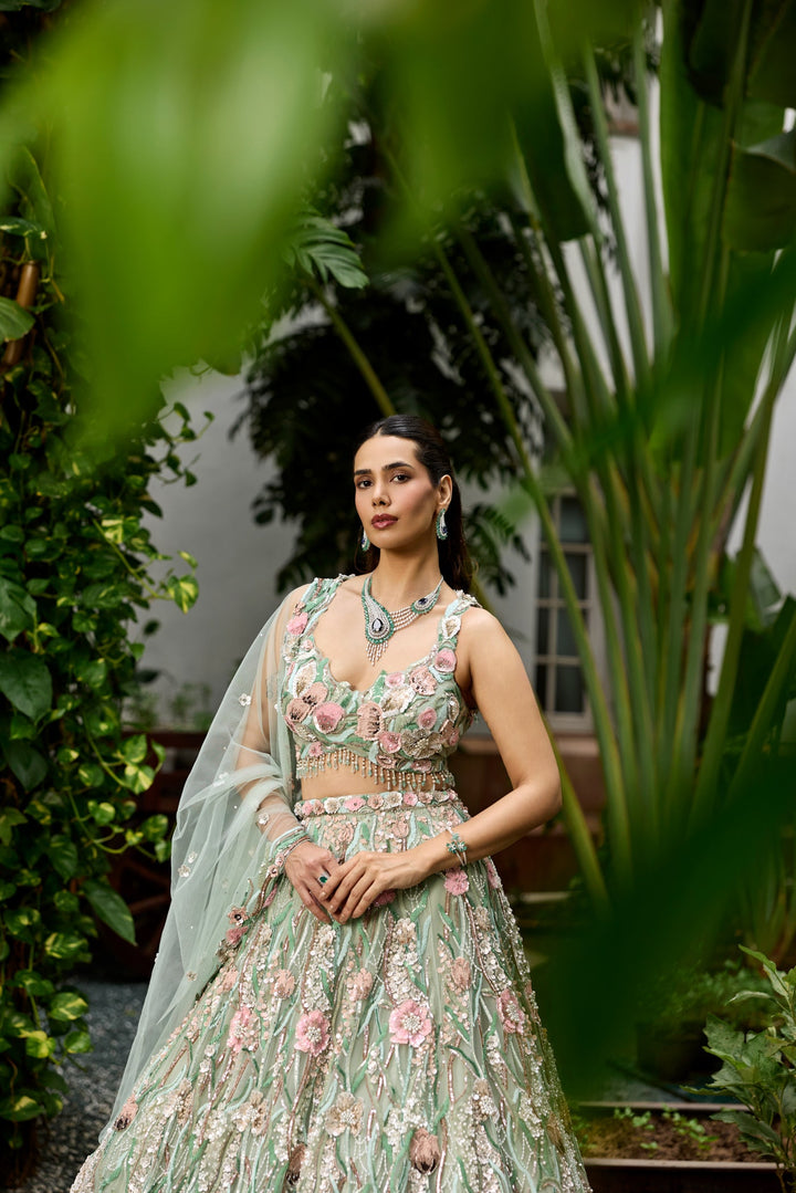 Modern couture lehenga with pastel tones, 3D flowers and elegant dupatta