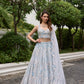 Elegant blue wedding lehenga with intricate floral embroidery and applique work