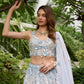 Powder blue lehenga with silver embroidery and floral 3D embellishments by Opus Atelier