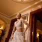 Designer bridal reception lehenga with sheer dupatta and handcrafted embellishments by opus atelier