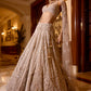 Designer bridal reception lehenga with sheer dupatta and handcrafted embellishments by opus atelier